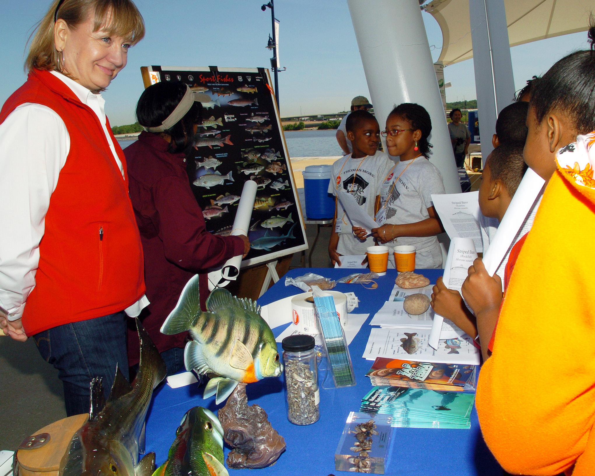 FWS employees teaching students about different fish at the 2009 Nation's River Bass Tournament.