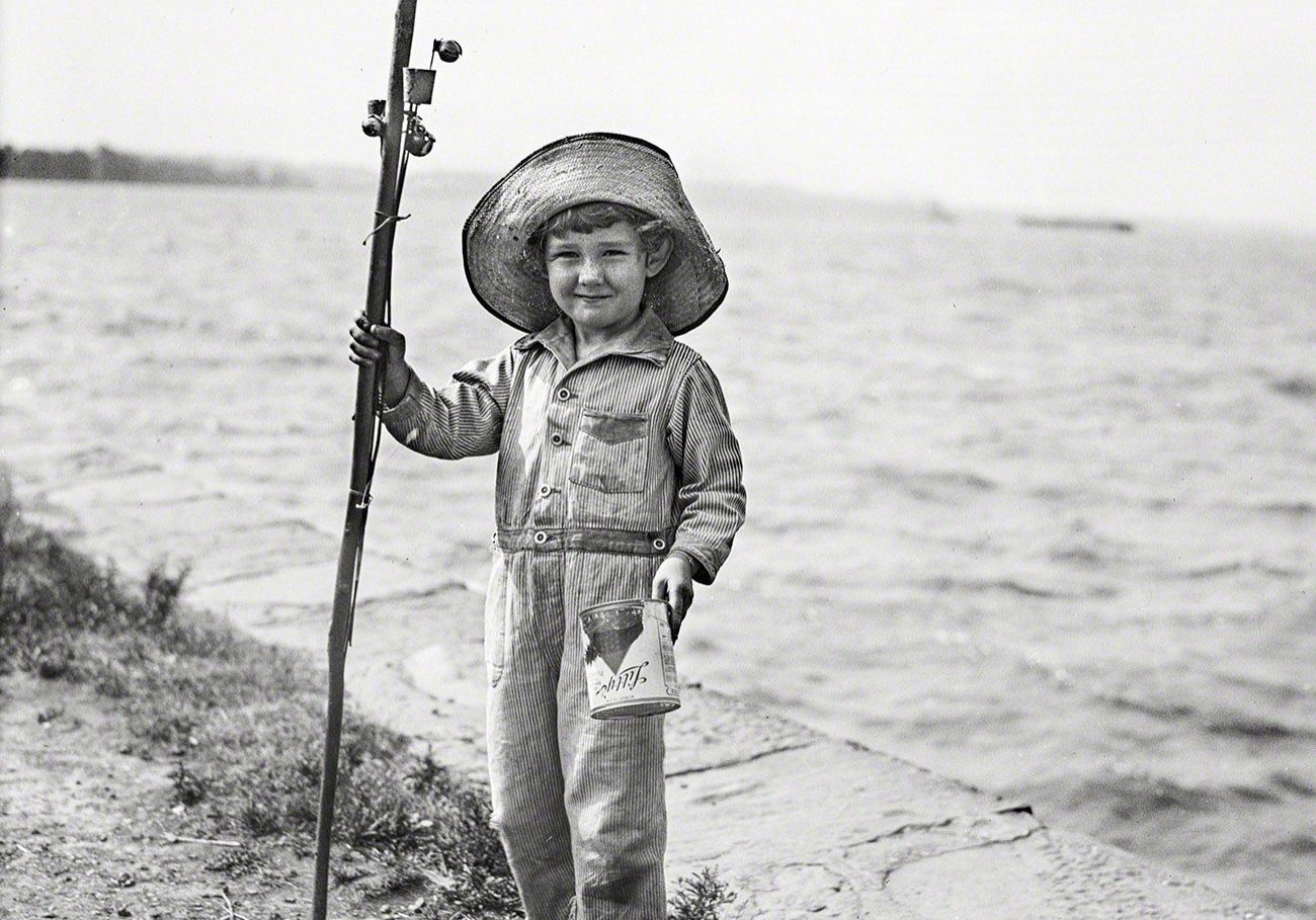 The_History_Of_Sportfishing_boy fishing with can of worms